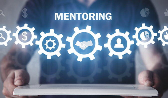Man holding a portable device. Above the device is the word "Mentoring" with images of gears with graphics in the center including a dollar sign, a small gear, two hands shaking, silhouette of a person, and a pie chart.