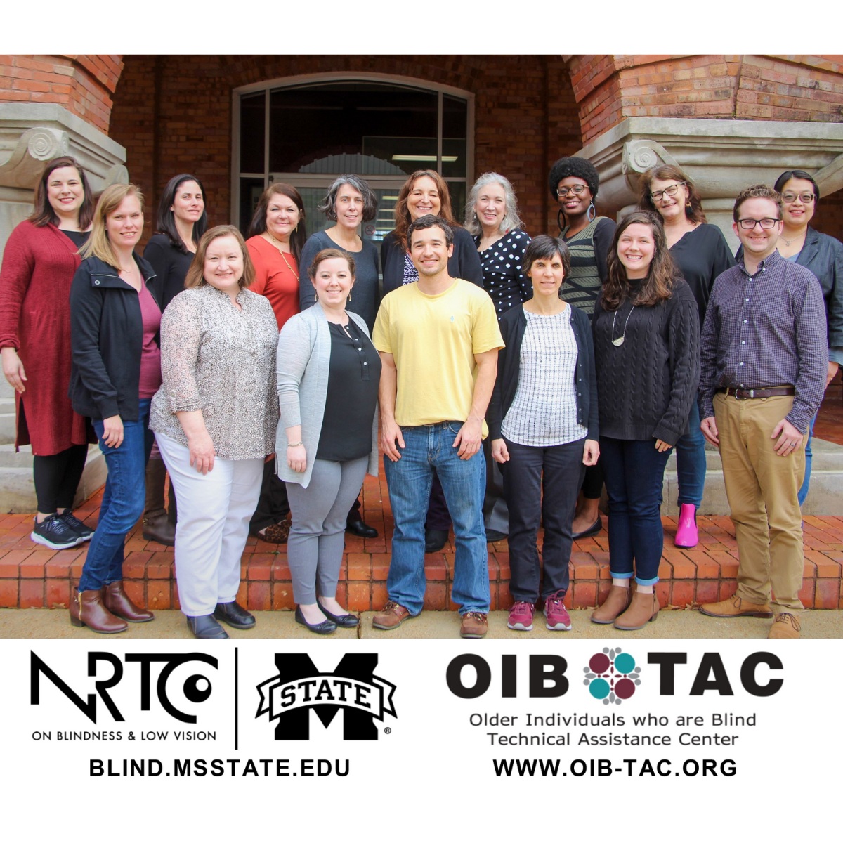 NRTC staff standing together for a group photo in front of the IED building.