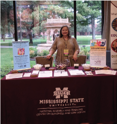 Karla Antonelli at NRTC info booth
