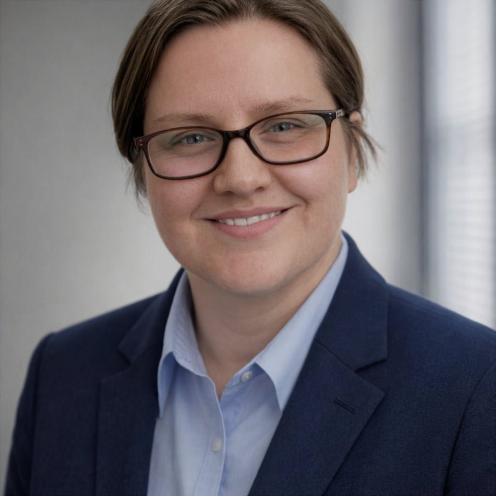 Headshot of Amanda Gochanour. She is wearing a navy blazer.